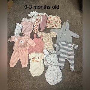 Baby clothes for 0-3 months. Can be boy or girl I’d think. Pants, onesies etc